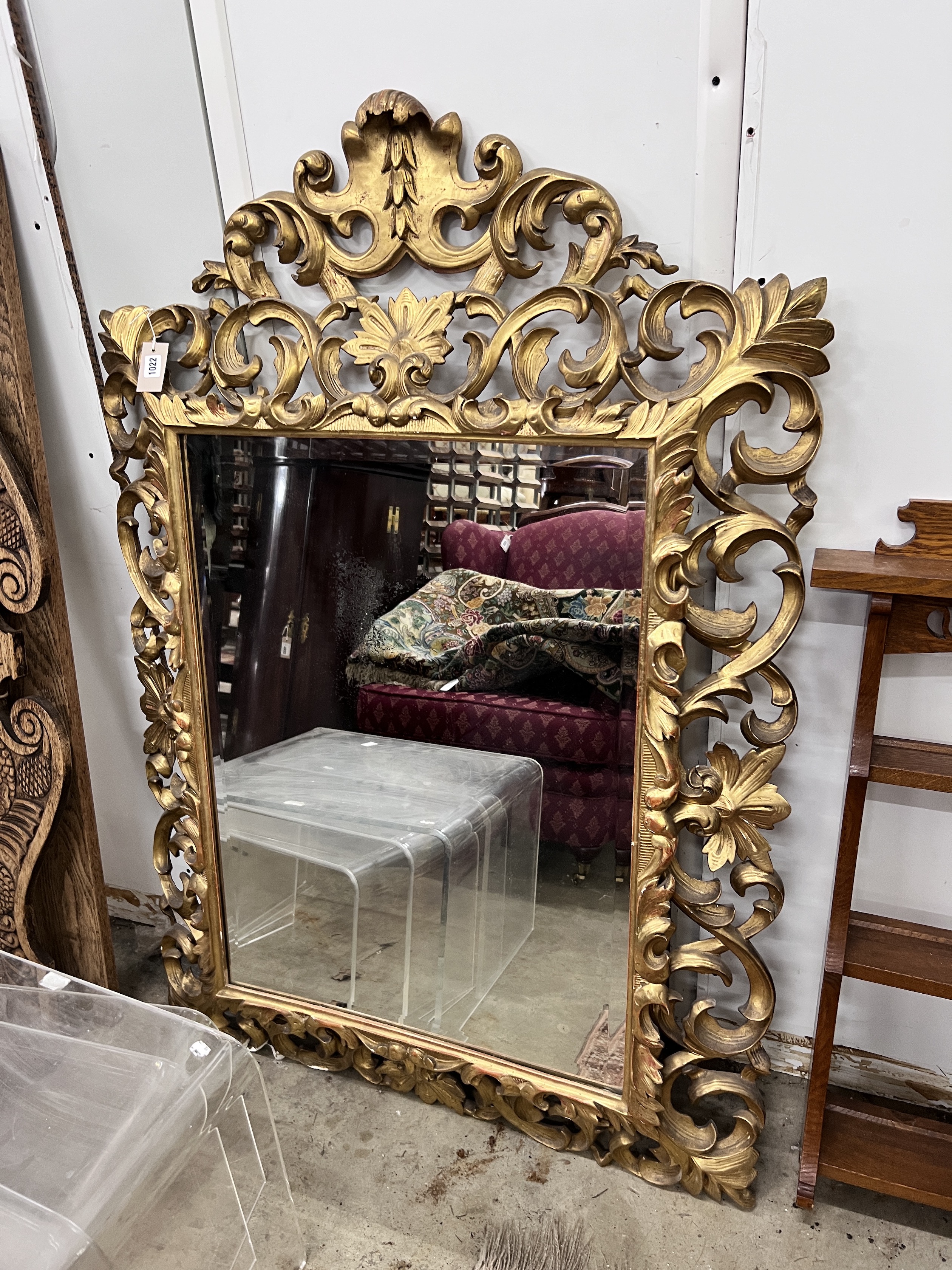 A 19th century French carved giltwood wall mirror, width 96cm, height 142cm